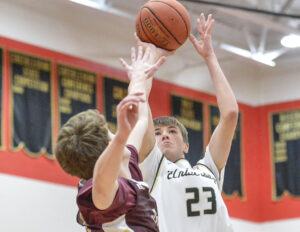 University boys' basketball team overcomes slow start, outlasts John Marshall in home finale